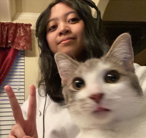 Me with my cat, Raffy.